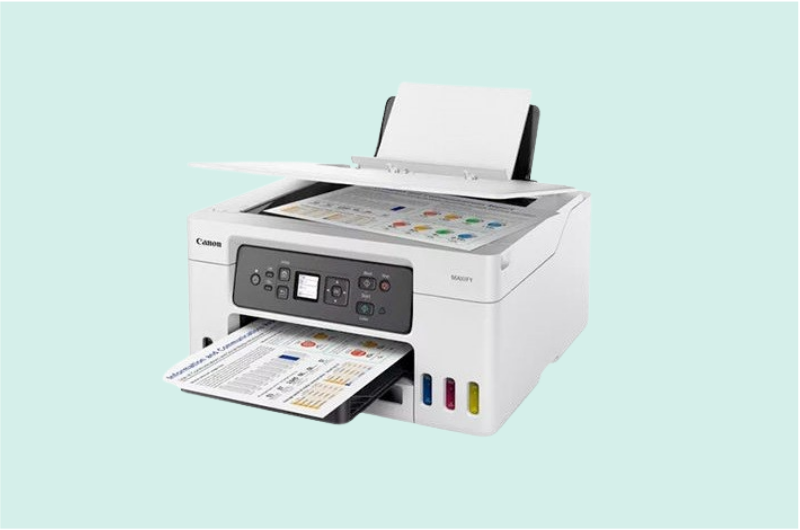 Impresora inkjet compacta de color blanco con cartuchos de tinta visibles, ideal para uso doméstico y pequeña oficina